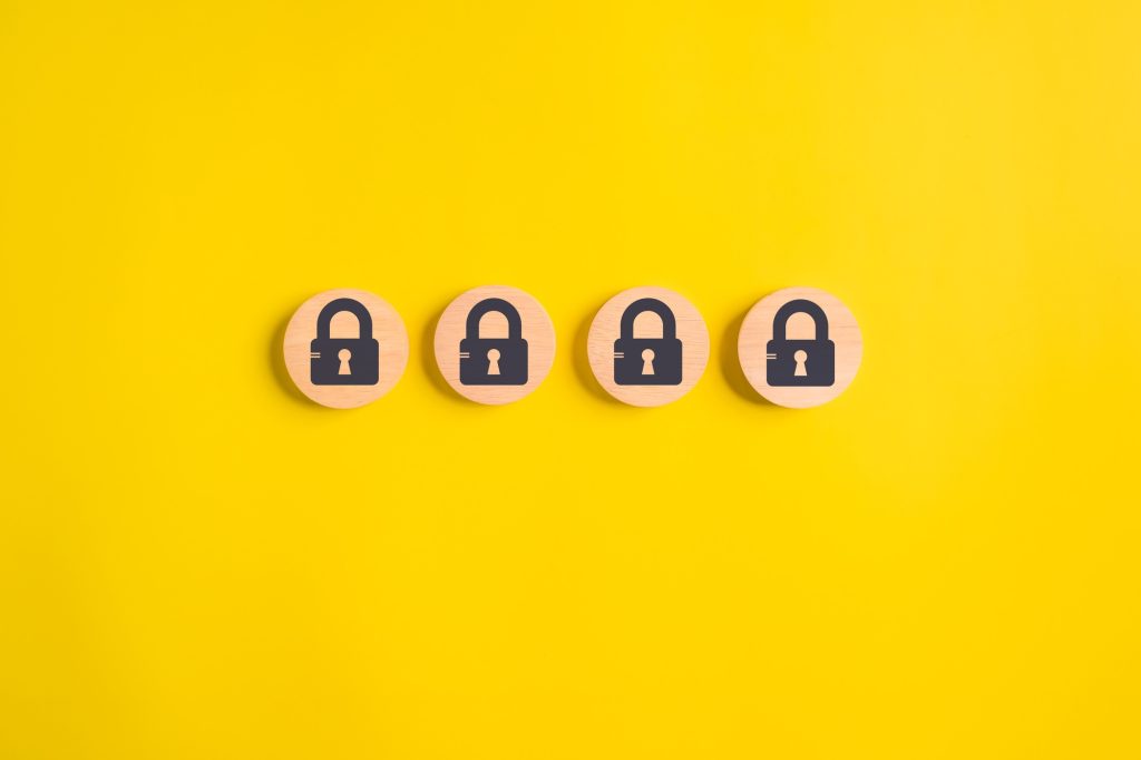 lock on wooden isolate background. privacy security lock. protect data.